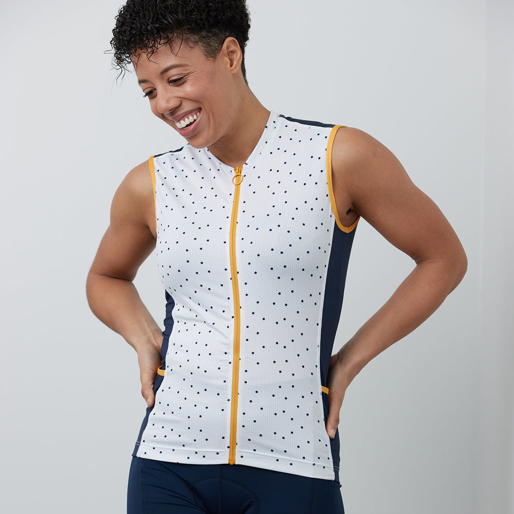 J723 POLKA maillot de vélo sans manches avec zip pleine longueur à l'avant. blanc avec pois polka marine et accents marine et ocre, vue de face